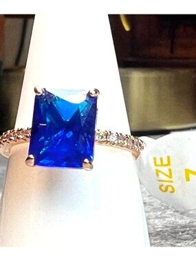 Ring Bomb Party Ring size 7 deep blue stone rose gold color band